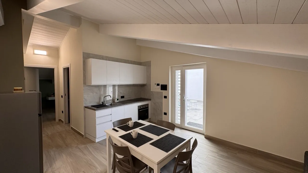 Kitchenette and dining area of the penthouse apartment